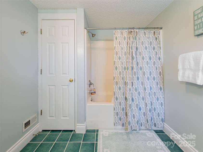 8 Hickory Ridge, Fletcher, NC 28732.  MLS# CAR4247492, YatesRealty ID 7046. Lower Level Full Bath