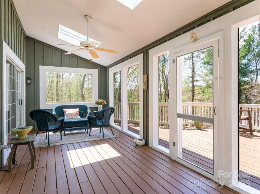8 Hickory Ridge, Fletcher, NC 28732.  MLS# CAR4247492, YatesRealty ID 7046. Screen Porch connects to large deck