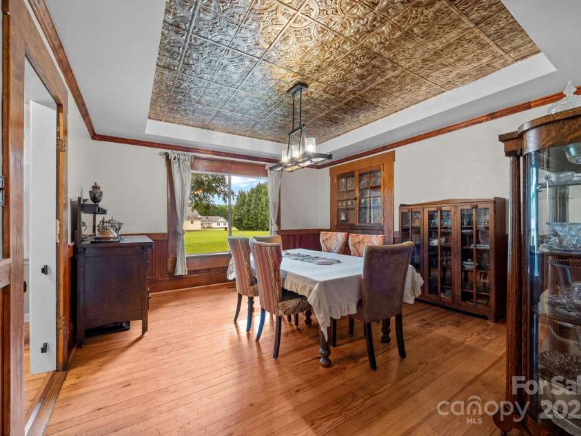 8900 Old Concord Road, Salisbury, NC 28146.  MLS# CAR4295325, YatesRealty ID 7046. Dining room with built-ins and punched tin ceiling