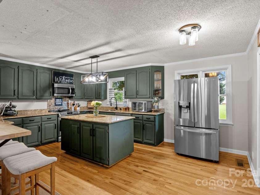 8900 Old Concord Road, Salisbury, NC 28146.  MLS# CAR4295325, YatesRealty ID 7046. Kitchen featuring large island & all appliances come with it!