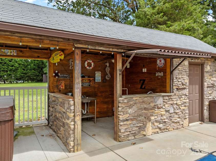 8900 Old Concord Road, Salisbury, NC 28146.  MLS# CAR4295325, YatesRealty ID 7046. Outdoor bar perfect for entertaining