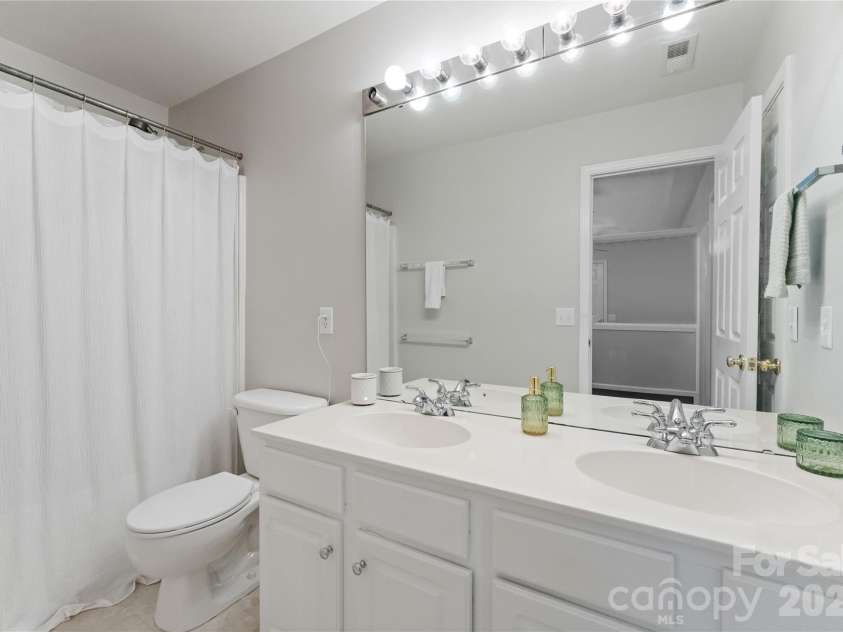 20127 Beard Street, Cornelius, NC 28031.  MLS# CAR4315027, YatesRealty ID 7051. UPPER LEVEL HALL BATH