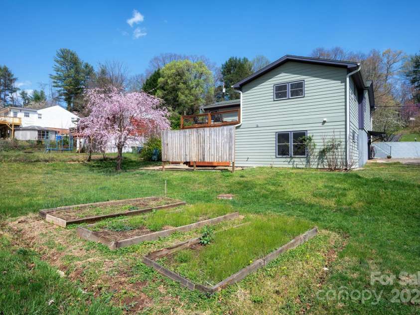 244 Bear Creek Road, Asheville, NC 28806.  MLS# CAR4243521, YatesRealty ID 7055. 15 yr+ Established Organic Garden Beds