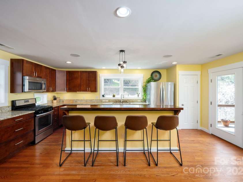 244 Bear Creek Road, Asheville, NC 28806.  MLS# CAR4243521, YatesRealty ID 7055. Home Cooks Delight!