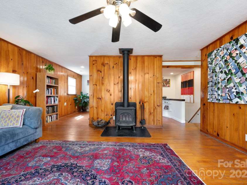 244 Bear Creek Road, Asheville, NC 28806.  MLS# CAR4243521, YatesRealty ID 7055. Wood Stove is Perfect for Chilly Days