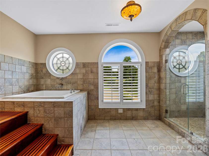 1090 Pearidge Road, Bostic, NC 28018.  MLS# CAR4283526, YatesRealty ID 7056. Jack-and-Jill Bathroom serving second and third bedroom on upper level.