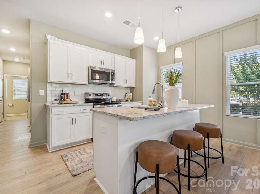 4618 Lakeview Road, Charlotte, NC 28216.  MLS# CAR4352407, YatesRealty ID 7056. Representative Photo - actual home may differ. 