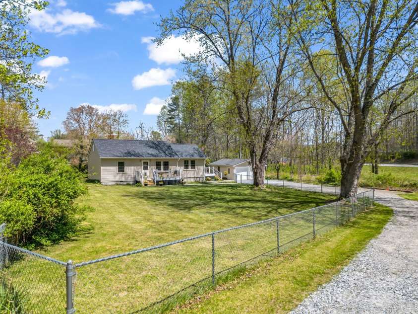 565 Nicholson Creek Road, Brevard, NC 28712.  MLS# CAR4247308, YatesRealty ID 7058. 