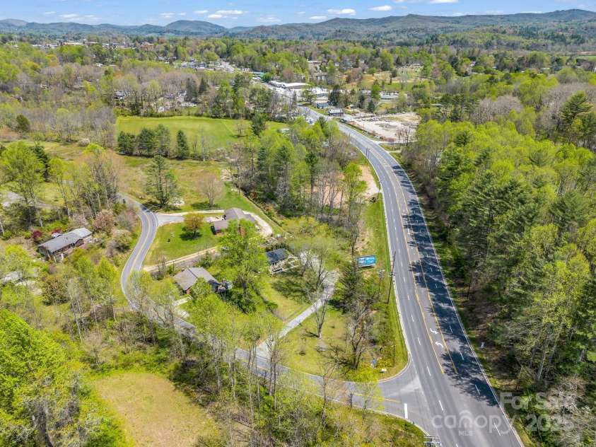 565 Nicholson Creek Road, Brevard, NC 28712.  MLS# CAR4247308, YatesRealty ID 7058. 