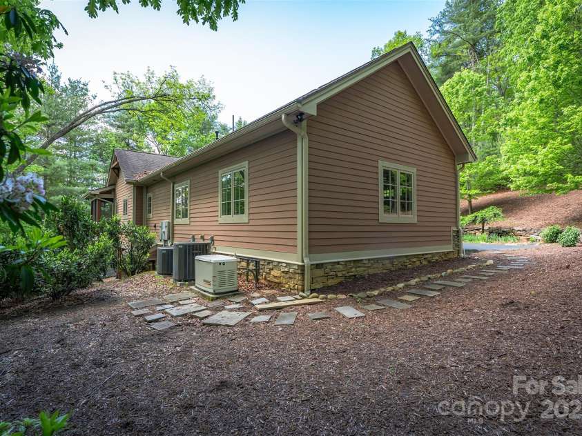 168 Chattooga Run, Hendersonville, NC 28739.  MLS# CAR4250934, YatesRealty ID 706. 3-car garage with windows for extra light