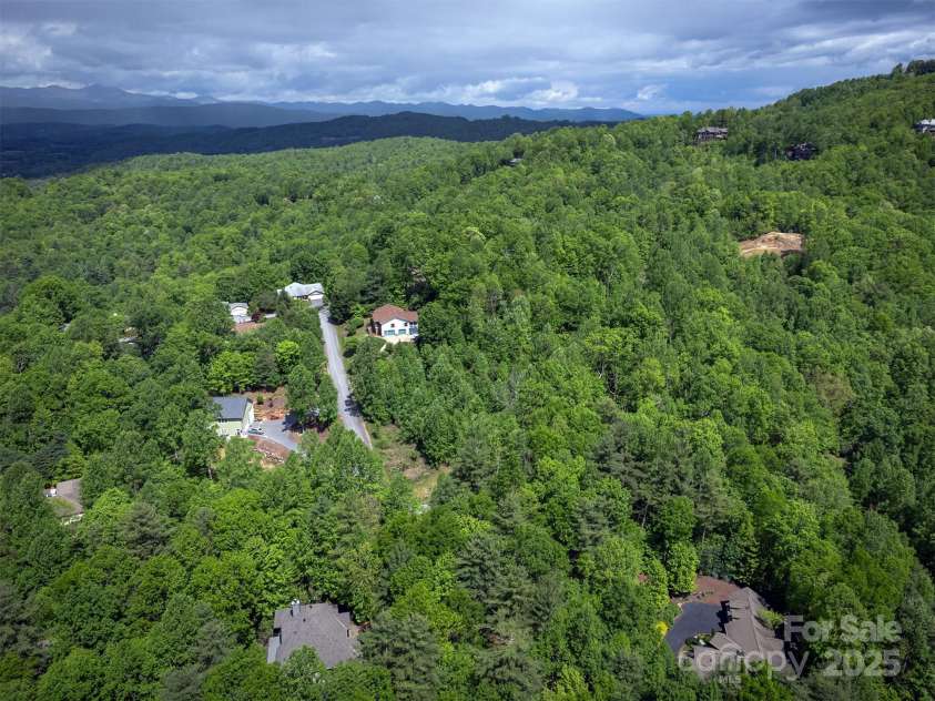 168 Chattooga Run, Hendersonville, NC 28739.  MLS# CAR4250934, YatesRealty ID 706. Champion Hills settles ideally in the eastern edges of the Blue Ridge Mountains, just 8 minutes from downtown Hendersonville and 30 minutes south of Asheville
