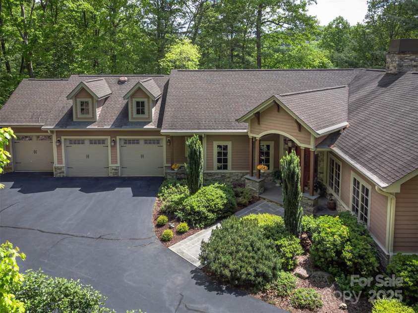 168 Chattooga Run, Hendersonville, NC 28739.  MLS# CAR4250934, YatesRealty ID 706. Charming custom entry that welcomes you home