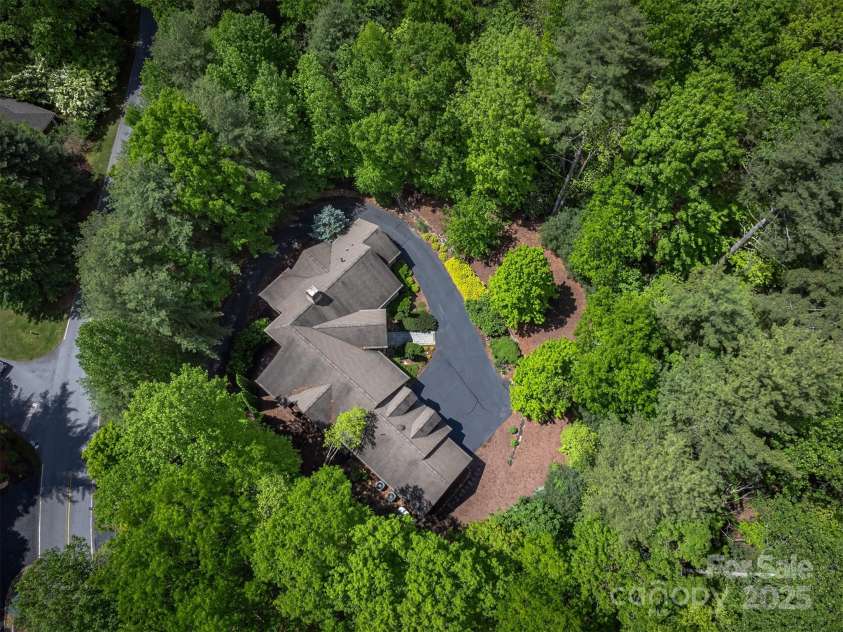 168 Chattooga Run, Hendersonville, NC 28739.  MLS# CAR4250934, YatesRealty ID 706. Designed with precision, this home perfectly complements its lot and showcases superior craftsmanship