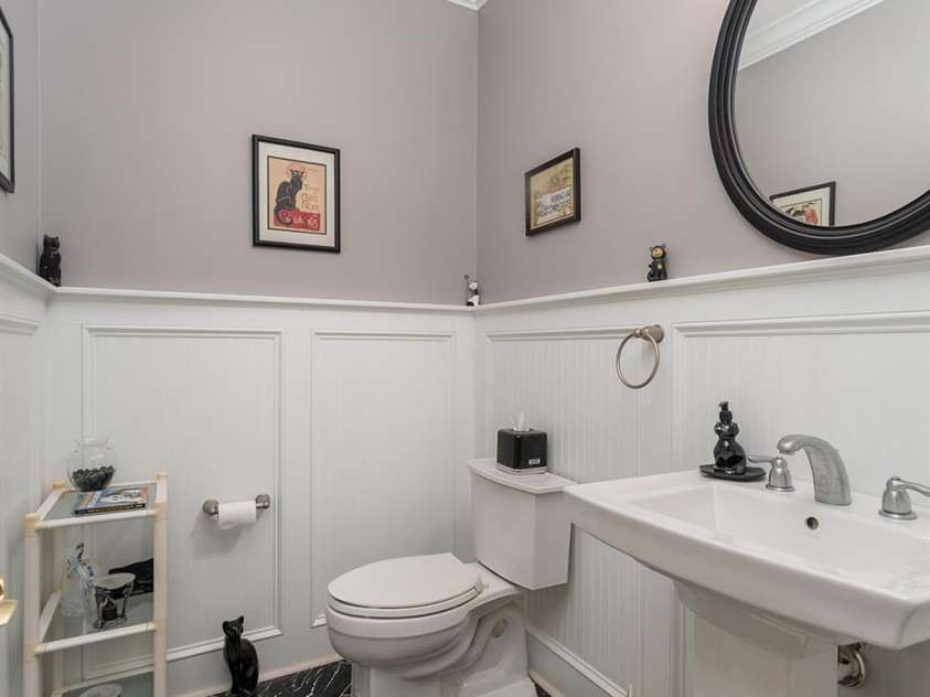 168 Chattooga Run, Hendersonville, NC 28739.  MLS# CAR4250934, YatesRealty ID 706. Half bath with stunning wood paneling, crafted with no shortcuts, located off the family room