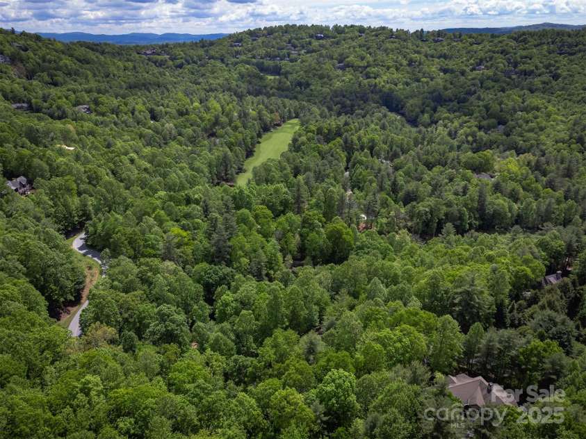 168 Chattooga Run, Hendersonville, NC 28739.  MLS# CAR4250934, YatesRealty ID 706. Nestled in the renowned Champion Hills golf course community