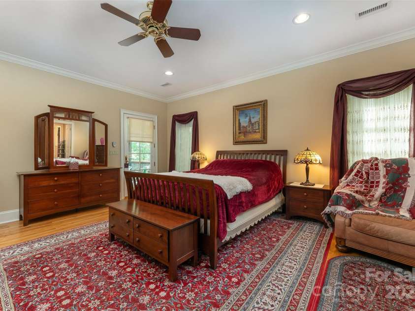 168 Chattooga Run, Hendersonville, NC 28739.  MLS# CAR4250934, YatesRealty ID 706. Spacious primary bedroom on the main level for easy living