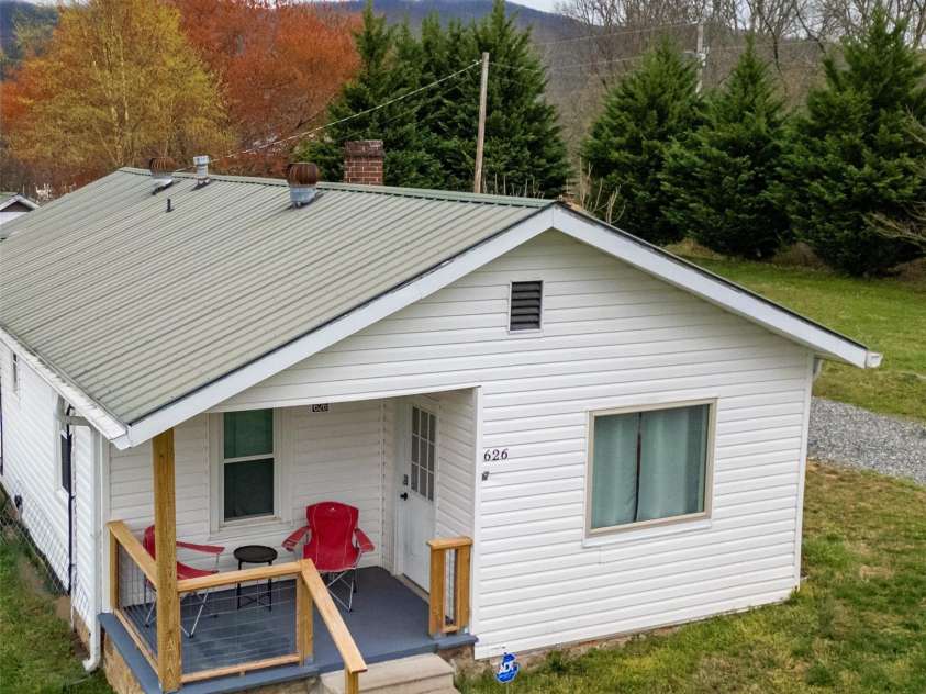 626 Fairview Loop, Hot Springs, NC 28743.  MLS# CAR4302454, YatesRealty ID 706. House Front from above street
