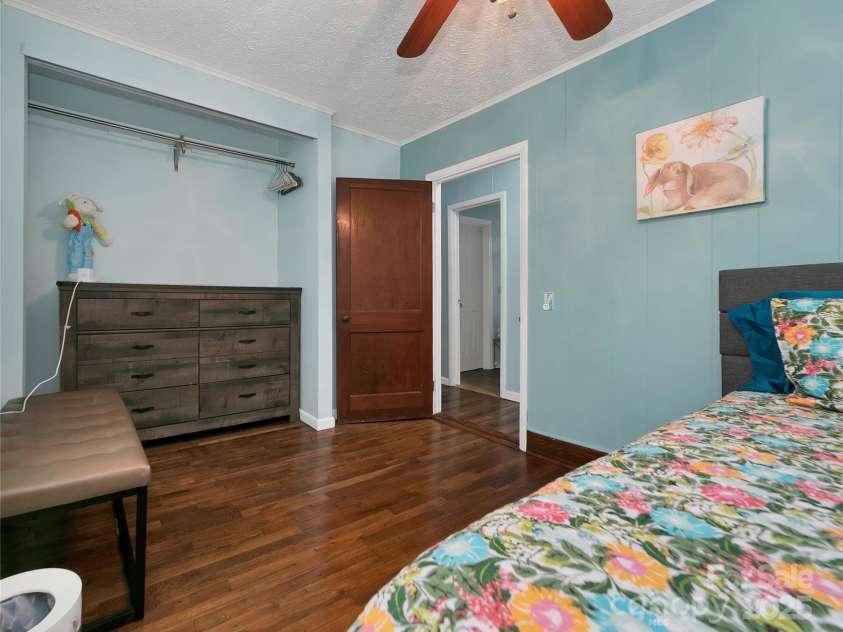626 Fairview Loop, Hot Springs, NC 28743.  MLS# CAR4302454, YatesRealty ID 706. The middle bedroom is alive with bunny rabbits in every corner! Immediately across the hall from the hall bathroom.
