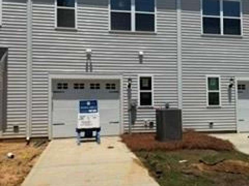 4614 Lakeview Road, Charlotte, NC 28216.  MLS# CAR4355641, YatesRealty ID 7060. Homesite 2 features a rear load one car garage with tandem driveway