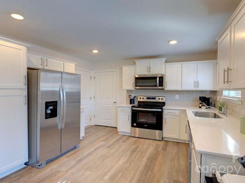 22 Cain Hollow Way, Asheville, NC 28806.  MLS# CAR4181112, YatesRealty ID 7069. Photos are representative