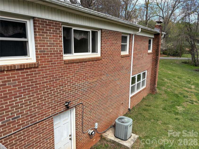 2137 23rd Street Drive, Hickory, NC 28602.  MLS# CAR4356350, YatesRealty ID 7070. Back with basement entry