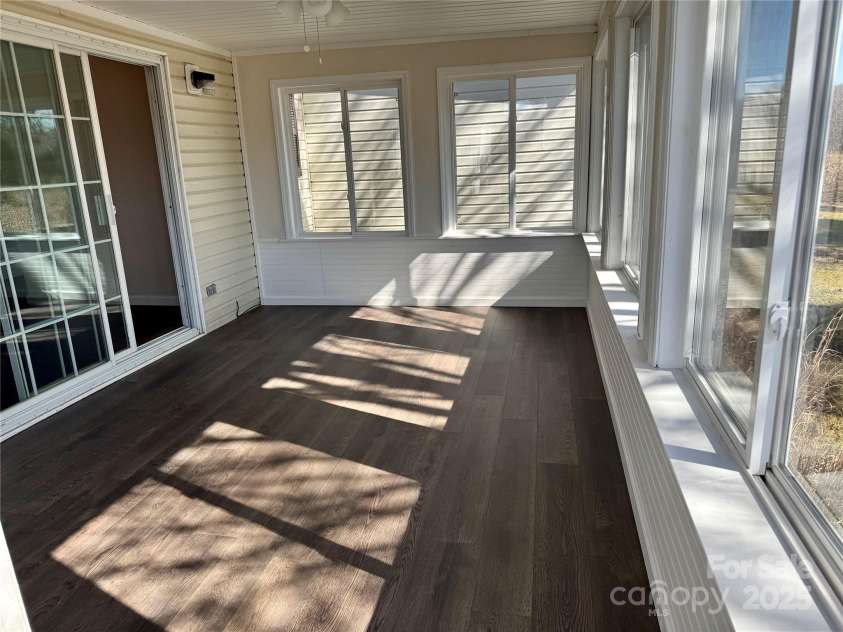 436 Riverwind Drive, Hendersonville, NC 28739.  MLS# CAR4219955, YatesRealty ID 7070. Sunroom