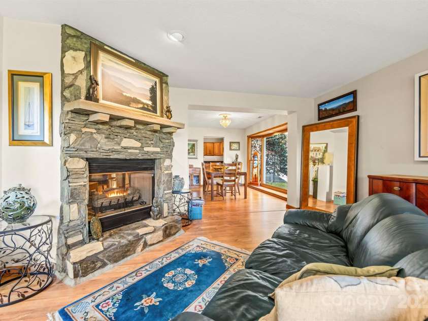 336 Berry Lane, Bryson City, NC 28713.  MLS# CAR4313303, YatesRealty ID 708. Dual sided fireplace