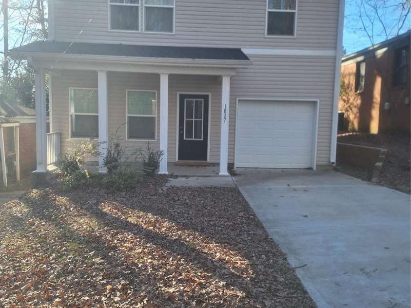 1827 Mcdonald Street, Charlotte, NC 28216.  MLS# CAR4214325, YatesRealty ID 7084. Front of Home