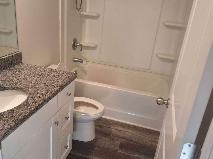 1827 Mcdonald Street, Charlotte, NC 28216.  MLS# CAR4214325, YatesRealty ID 7084. Upstairs guest bathroom