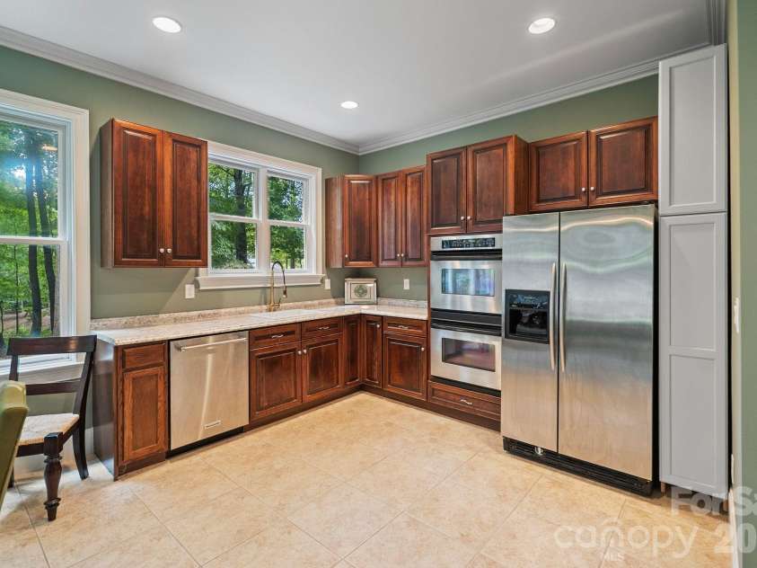 8915 Warwicke Lane, Sherrills Ford, NC 28673.  MLS# CAR4353369, YatesRealty ID 7093. Basement Kitchen