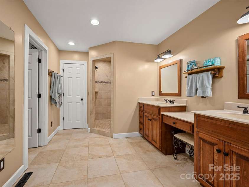 6753 Pinnacle Mountain Road, Zirconia, NC 28790.  MLS# CAR4237345, YatesRealty ID 7098. Primary Bathroom
