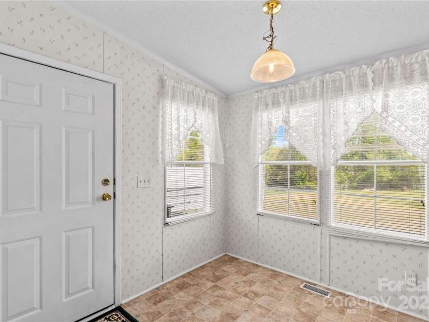 231 Charity Lane, Linwood, NC 27299.  MLS# CAR4247704, YatesRealty ID 7099. 