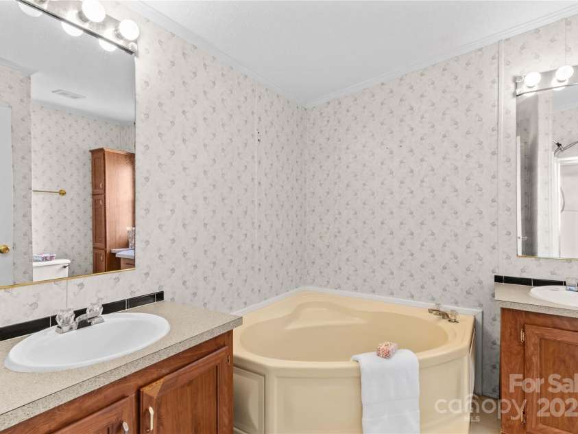 231 Charity Lane, Linwood, NC 27299.  MLS# CAR4247704, YatesRealty ID 7099. 