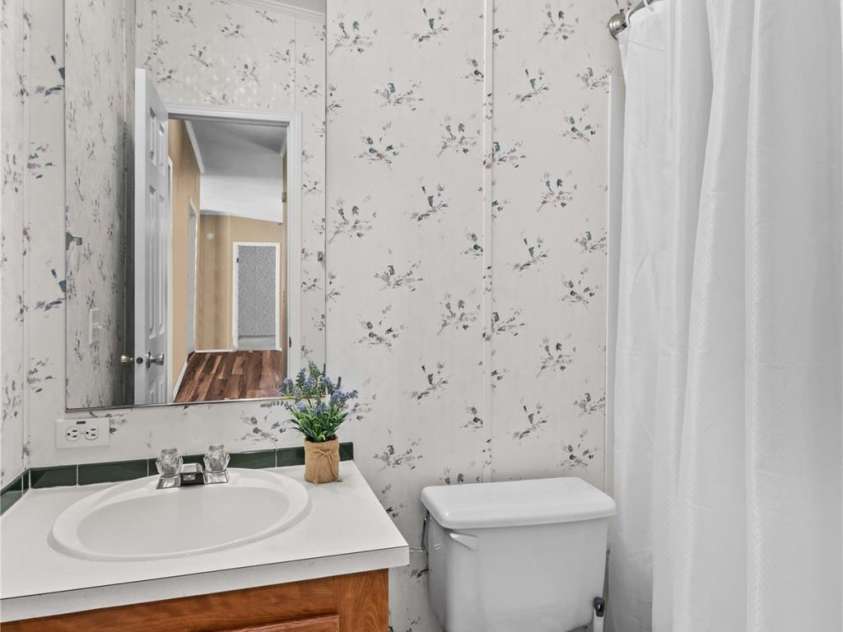 231 Charity Lane, Linwood, NC 27299.  MLS# CAR4247704, YatesRealty ID 7099. 