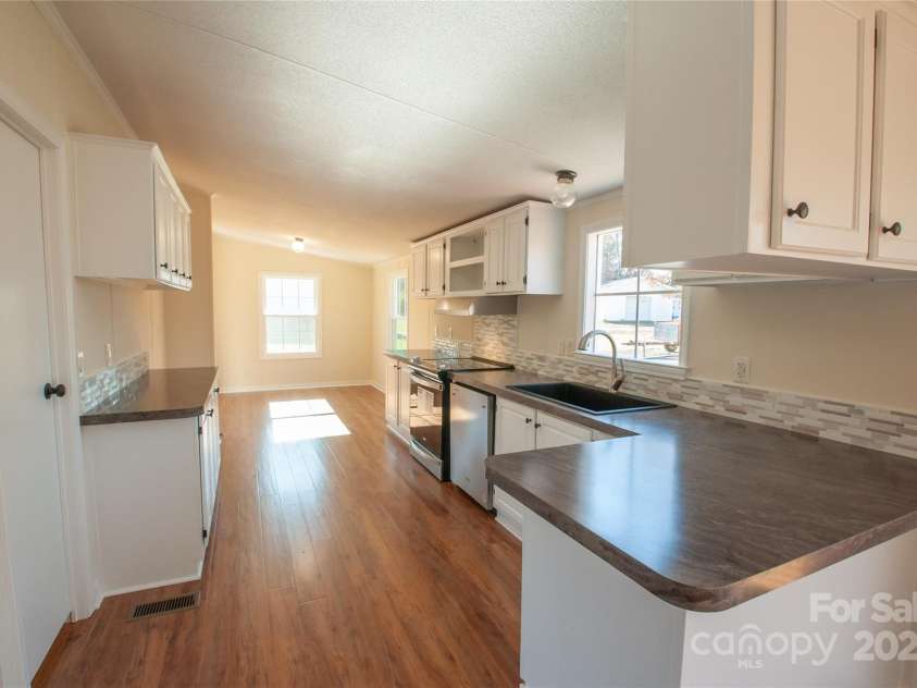 816 Perry Road, Troutman, NC 28166.  MLS# CAR4210141, YatesRealty ID 710. Another view kitchen