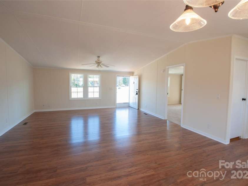 816 Perry Road, Troutman, NC 28166.  MLS# CAR4210141, YatesRealty ID 710. Greatroom to front door