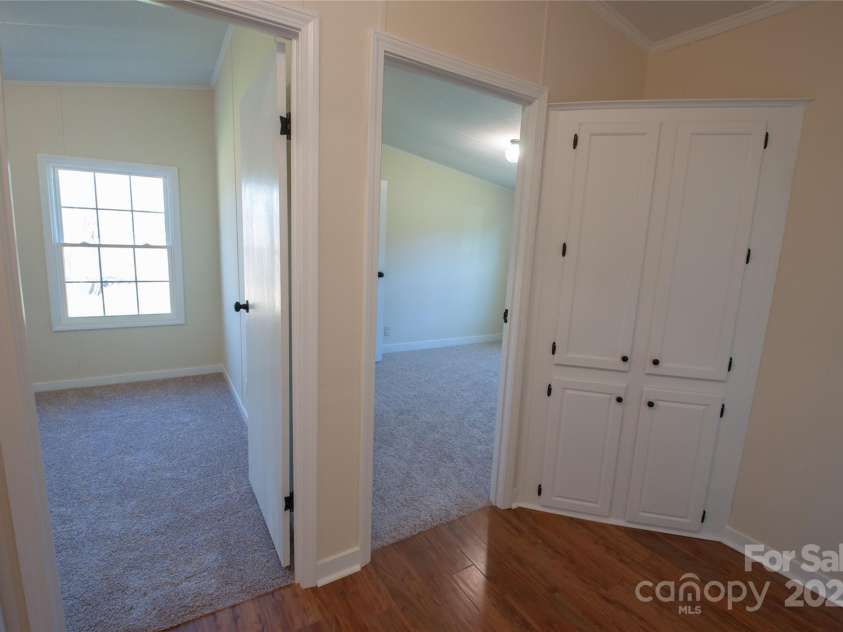 816 Perry Road, Troutman, NC 28166.  MLS# CAR4210141, YatesRealty ID 710. Office room Plus storage in hallway