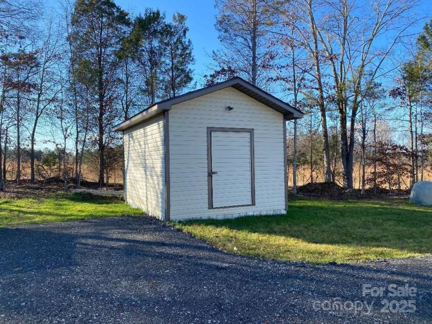 816 Perry Road, Troutman, NC 28166.  MLS# CAR4210141, YatesRealty ID 710. Storage building new