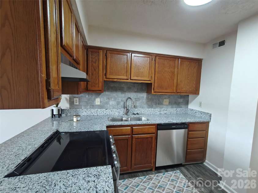 1 Buffalo Avenue, Concord, NC 28025.  MLS# CAR4395022, YatesRealty ID 7102. 