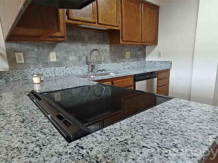 1 Buffalo Avenue, Concord, NC 28025.  MLS# CAR4395022, YatesRealty ID 7102. 