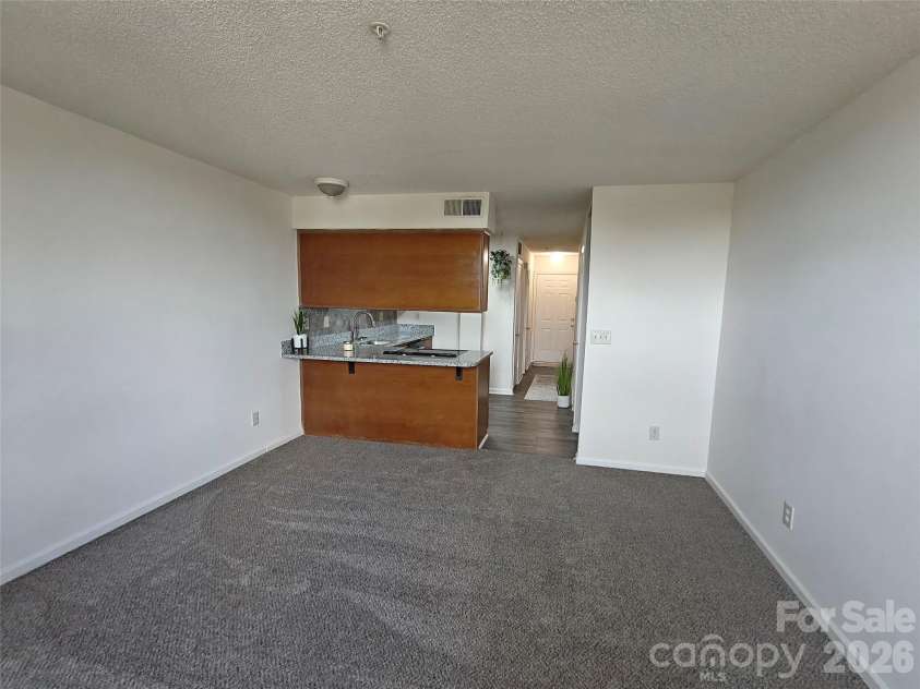 1 Buffalo Avenue, Concord, NC 28025.  MLS# CAR4395022, YatesRealty ID 7102. 