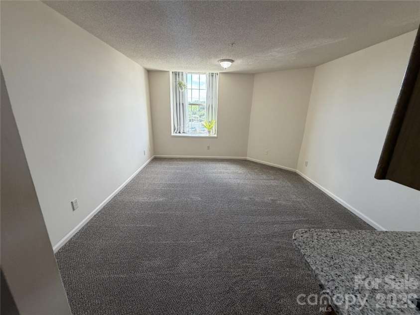 1 Buffalo Avenue, Concord, NC 28025.  MLS# CAR4395022, YatesRealty ID 7102. 