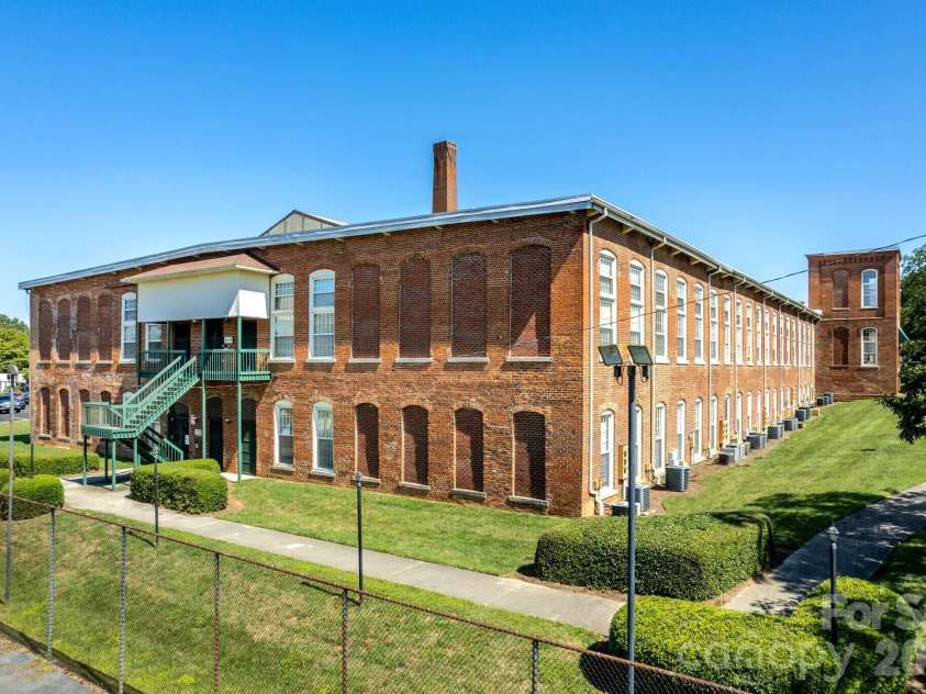 1 Buffalo Avenue, Concord, NC 28025.  MLS# CAR4395022, YatesRealty ID 7102. 