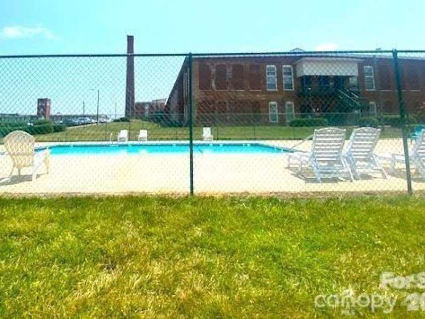 1 Buffalo Avenue, Concord, NC 28025.  MLS# CAR4395022, YatesRealty ID 7102. 