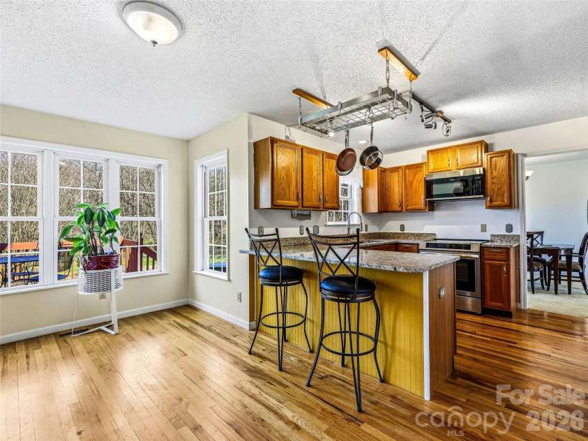 61 Rolling Hills Road, Mills River, NC 28759.  MLS# CAR4355749, YatesRealty ID 7110. Eat-in area of kitchen