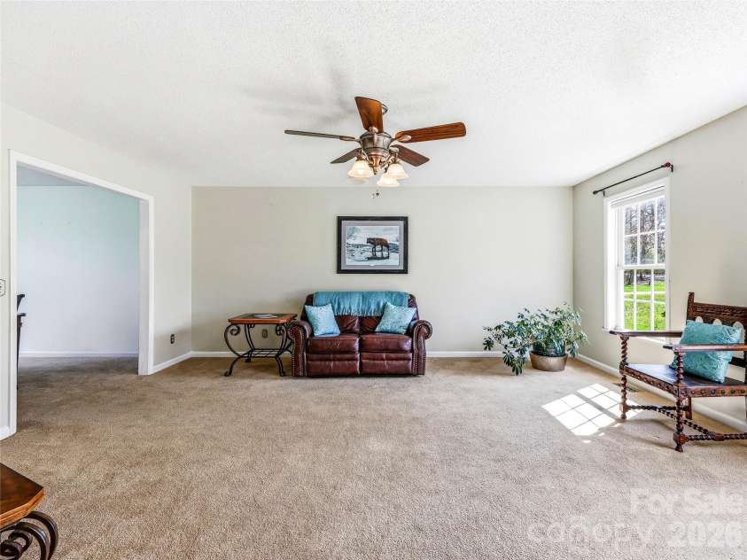61 Rolling Hills Road, Mills River, NC 28759.  MLS# CAR4355749, YatesRealty ID 7110. Living room with lots of natural light