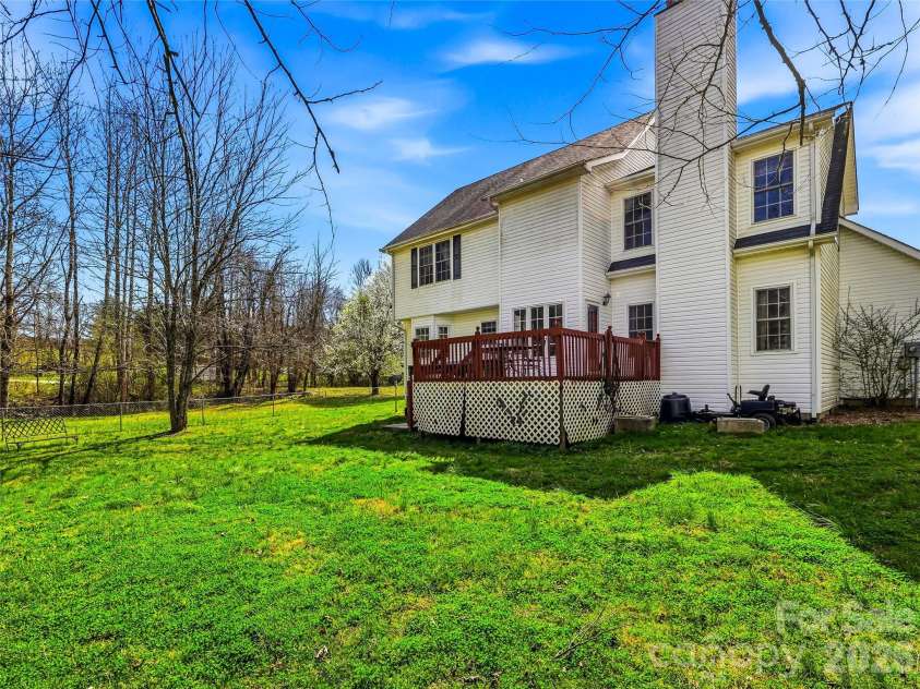 61 Rolling Hills Road, Mills River, NC 28759.  MLS# CAR4355749, YatesRealty ID 7110. Storage underneath the deck and to the side.