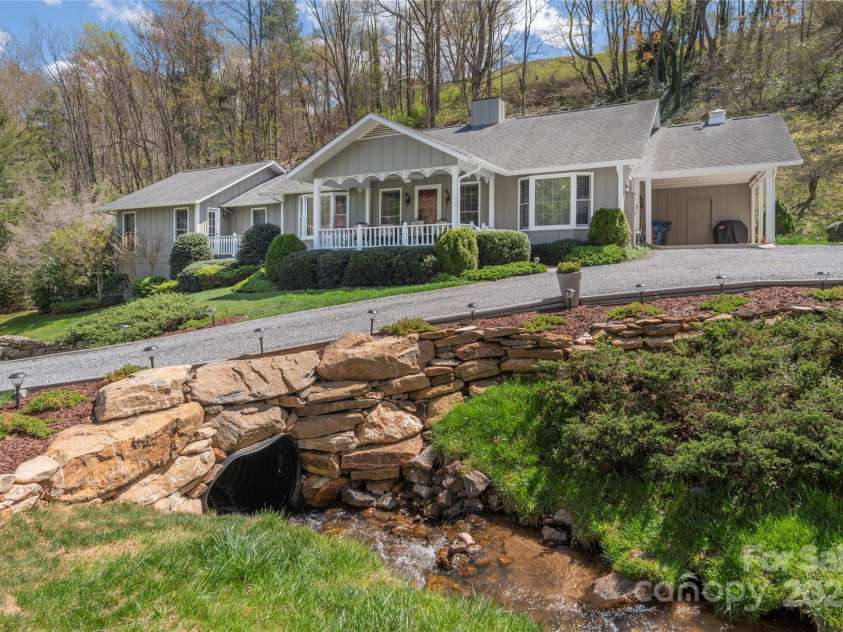 549 Eagles Nest Road, Waynesville, NC 28786.  MLS# CAR4243977, YatesRealty ID 7112. A creek fronts the property