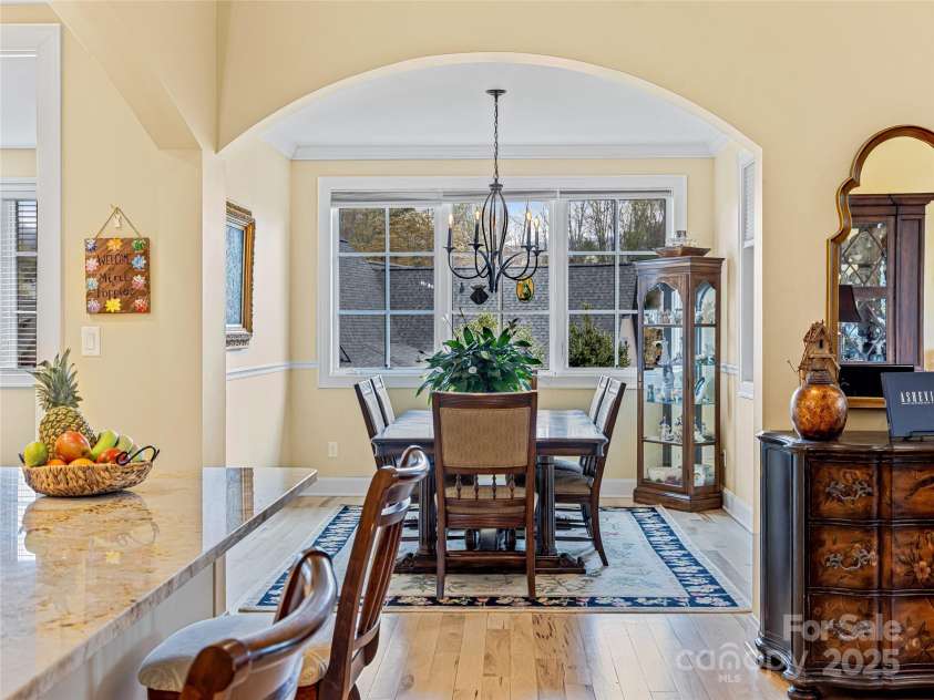 38 Chantilly Drive, Asheville, NC 28804.  MLS# CAR4245606, YatesRealty ID 7126. Kitchen is open with dining room