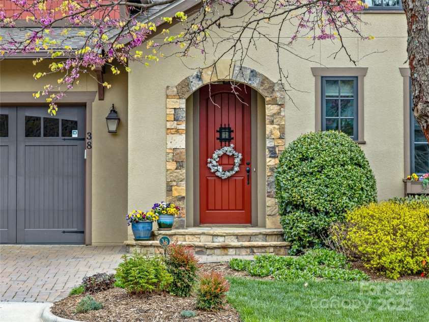 38 Chantilly Drive, Asheville, NC 28804.  MLS# CAR4245606, YatesRealty ID 7126. Stacked stone detail aroundt he door!